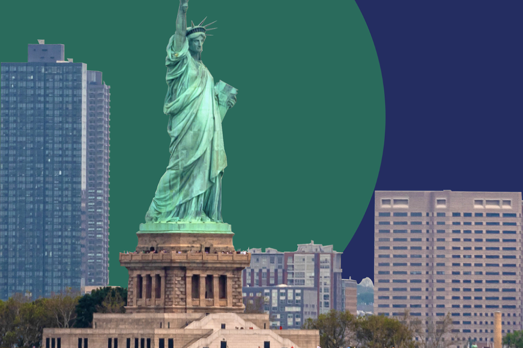 The Statue of Liberty and a small portion of the skyline of New York set against a graphically designed background. The background is a green semicircle against a dark blue background. US